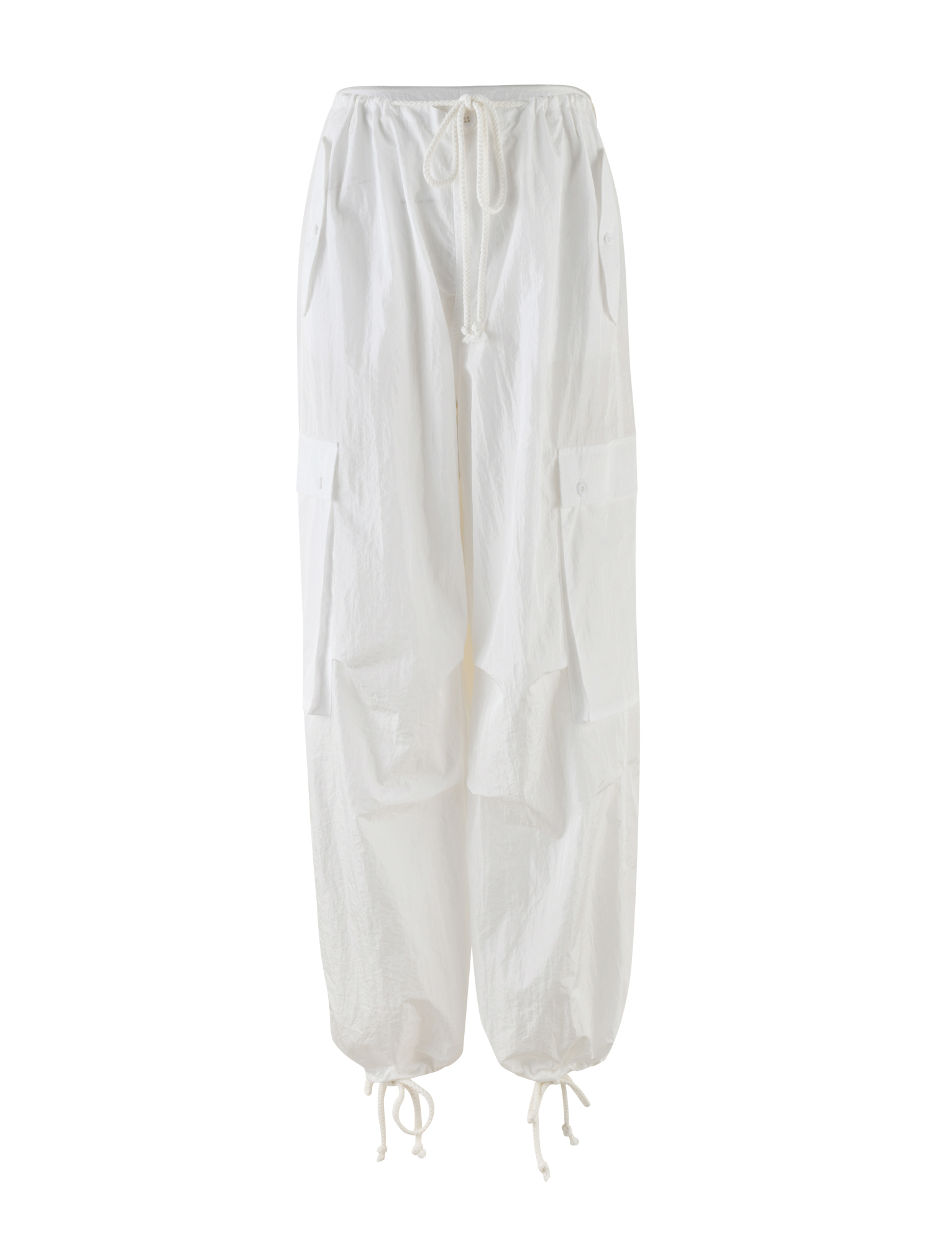 The TIGERMIST VIOLETTE PANT in white features an oversized fit, elastic drawstring waistband, large flap side pockets, and adjustable ankle drawstrings. Displayed on a plain white background.
