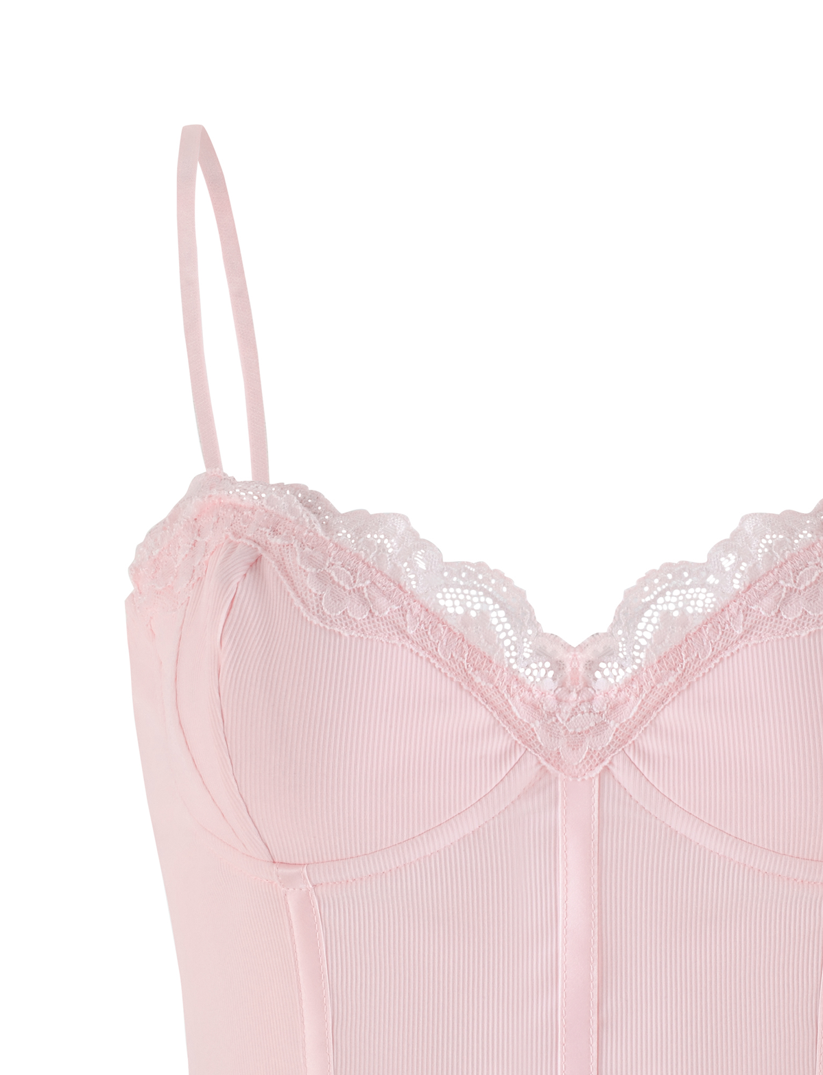 A close-up of the TIGERMIST NILA CORSET TOP in soft pink, featuring adjustable straps, lace-trimmed neckline, and subtle vertical ribbing on lightweight jersey fabric.