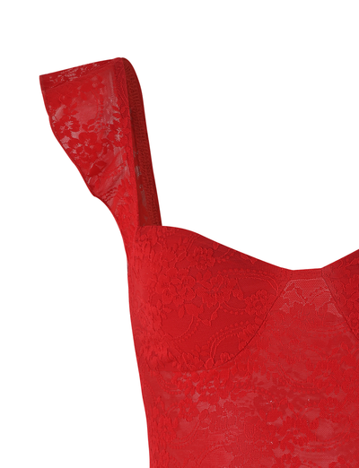 Close-up of the LORNA TOP in red by TIGERMIST, featuring a fitted bodice with vibrant floral lace and one visible shoulder strap.