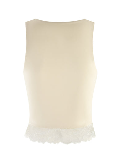 The DIONE LACE TOP by TIGERMIST is a sleeveless yellow top in soft butter jersey, showcased from the back. It features a delicate lace trim at the hem and has a smooth, slightly sheer appearance for an elegant look.
