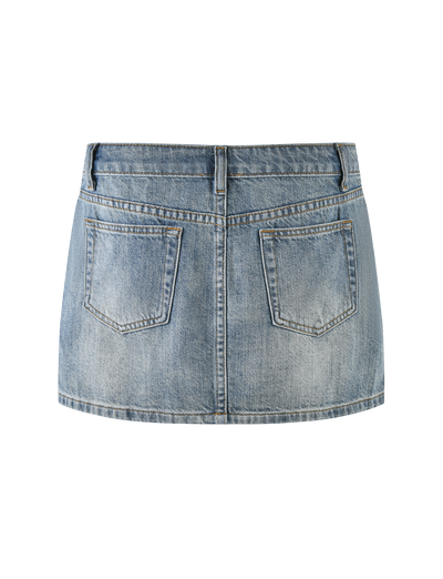 The TIGERMIST MICHAYLA MINI SKIRT - MID WASH features a back view with classic five-pocket styling, belt loops, two back pockets, and faded light blue denim details.
