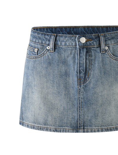 The MICHAYLA MINI SKIRT - MID WASH by TIGERMIST is a blue denim mini skirt with belt loops, front and classic five-pocket styling, button closure, and faded detailing.