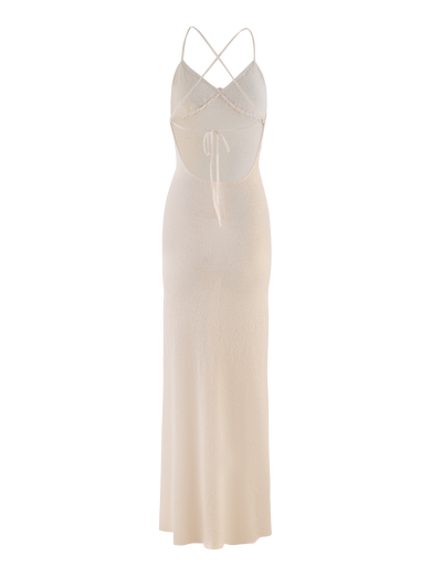 The TIGERMIST LAVELLE MAXI DRESS in cream is a sleeveless knit dress featuring a fitted bodice, thin crisscross straps, open back, front keyhole cutout with tie detail under the bust, and a straight midi-length skirt.