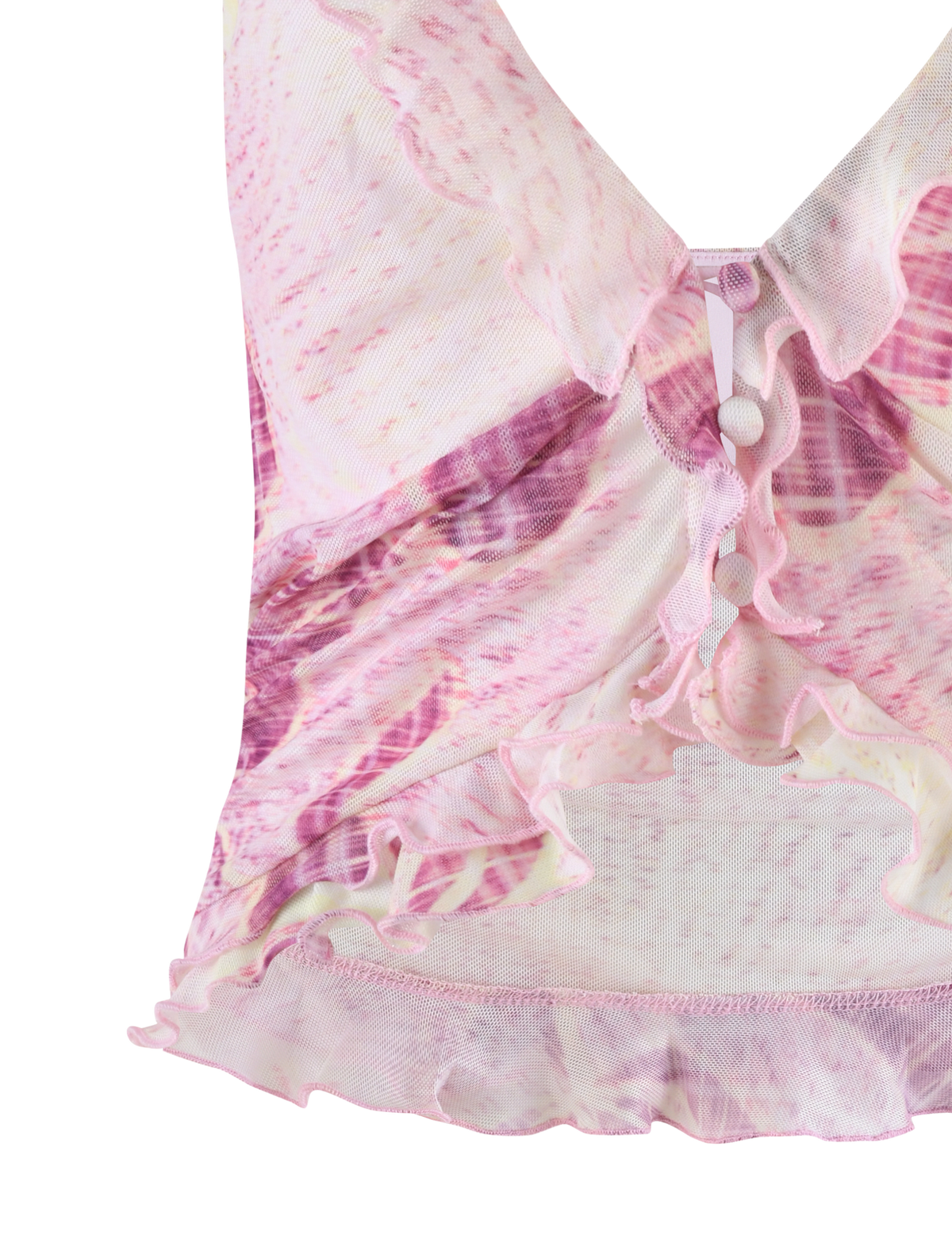 A close-up of the TIGERMIST DALILA TOP - GRUNGE FLORAL MAGENTA, featuring pink and purple sheer fabric, an exclusive wavy abstract print, decorative buttons, and layered ruffle edges.