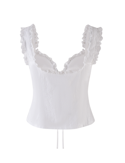 The KYANA TOP - WHITE by TIGERMIST is a feminine broderie camisole with a fitted bodice, lace-trimmed ruffled straps, delicate eyelet embroidery, and a softly curved sweetheart neckline.