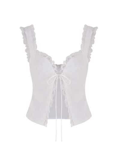 The KYANA TOP - WHITE by TIGERMIST is a white broderie crop top featuring a sweetheart bust, delicate lace trim, eyelet fabric, scalloped edges, wide straps, and a front ribbon tie.