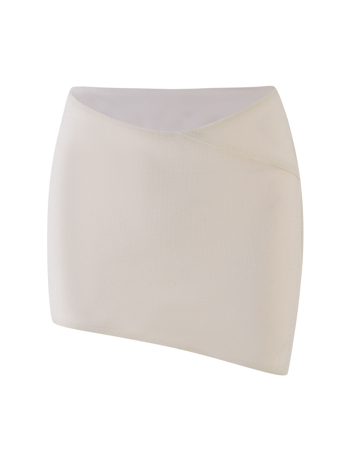 The TIGERMIST COBI SKIRT - WHITE : CREAM is a ribbed, asymmetrical mini skirt with a diagonal waistband in shimmer jersey, shown on a plain white background.