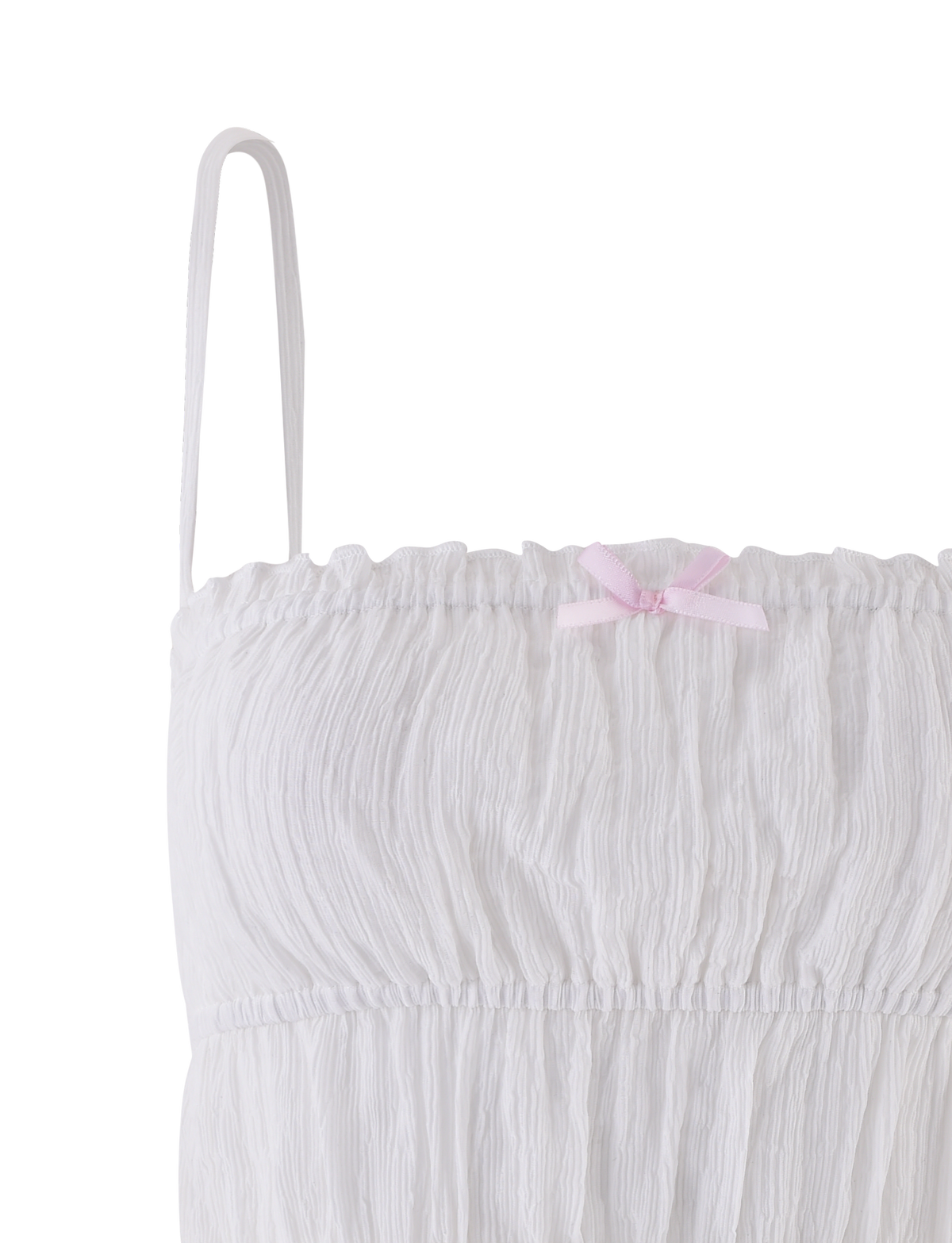 The ASHLYNN TOP - WHITE by TIGERMIST is a white tiered cami with a crinkled texture and satin bow detail at the top center, shown partially with one adjustable strap visible.