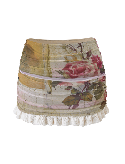 The TIGERMIST TILLEY MINI SKIRT - ROSE POSTCARD features a vintage-inspired floral mesh design with large pink roses, green leaves, and a white lace hem for an exclusive look.