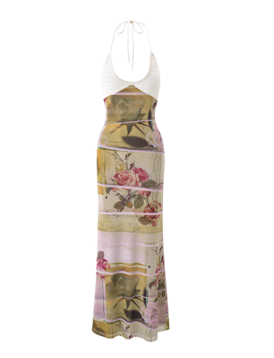 The TIGERMIST TILLEY MAXI DRESS - ROSE POSTCARD is a sleeveless maxi with a white halter neck top and a skirt adorned with large pink roses and olive green geometric rectangles.