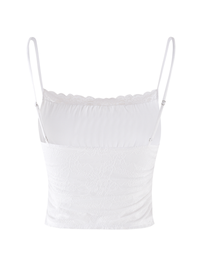The AVALYN TOP - WHITE by TIGERMIST features adjustable spaghetti straps, a scalloped lace neckline, and is made from stretchy fabric, shown on a plain white background.