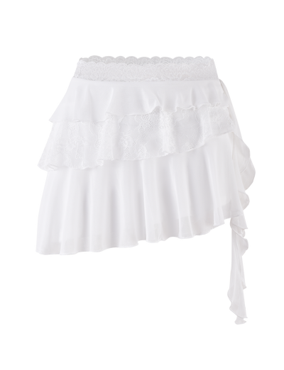 The AVALYN SKIRT - WHITE by TIGERMIST is an asymmetrical mesh mini skirt with layered sheer and lace ruffles, a delicate lace waistband, and a side tie detail.