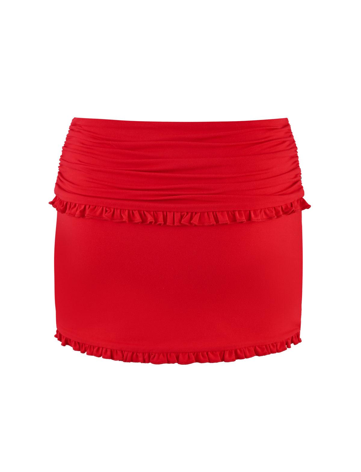 The GINNY SKORT - RED by TIGERMIST is a red, high-waisted mini skort with a bodycon fit, featuring ruching and ruffle details along the top and bottom edges, shown on a white background.