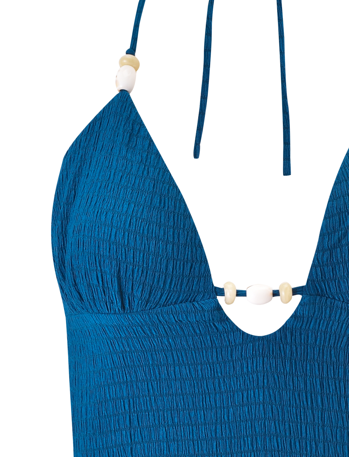 Close-up of the TIGERMIST ZINNIA TOP - BLUE, a halter bikini top with bead detailing on the straps and center front, finished with a stylish textured look.