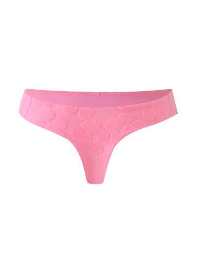 The FIORA BIKINI BOTTOM - BABY PINK by TIGERMIST features a delicate floral lace pattern and is shown against a light pink background.