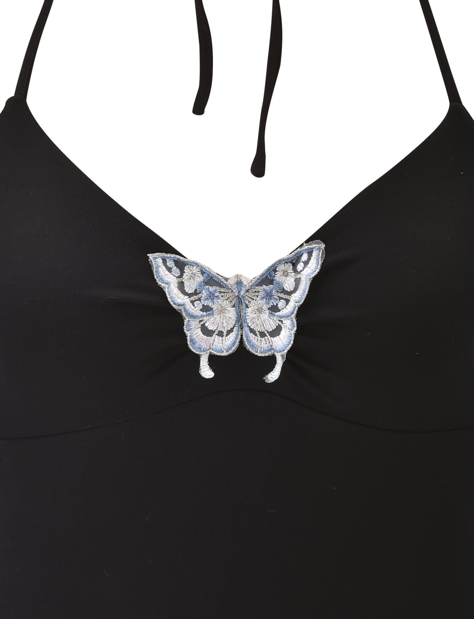 A close-up of the TIGERMIST CELESTINE TOP in black, a fitted halter style featuring a blue and white embroidered butterfly at the center chest.