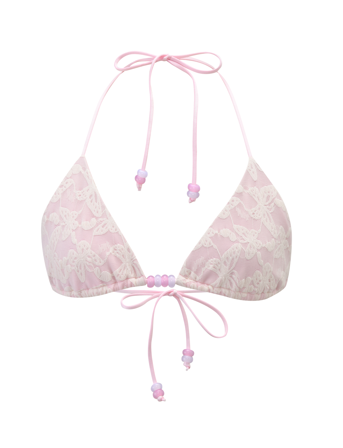 The BRIGITTE BIKINI TOP - IVORY LACE by TIGERMIST is a light pink lace halter bralette with butterfly patterns, front tie straps, and small pink beads.