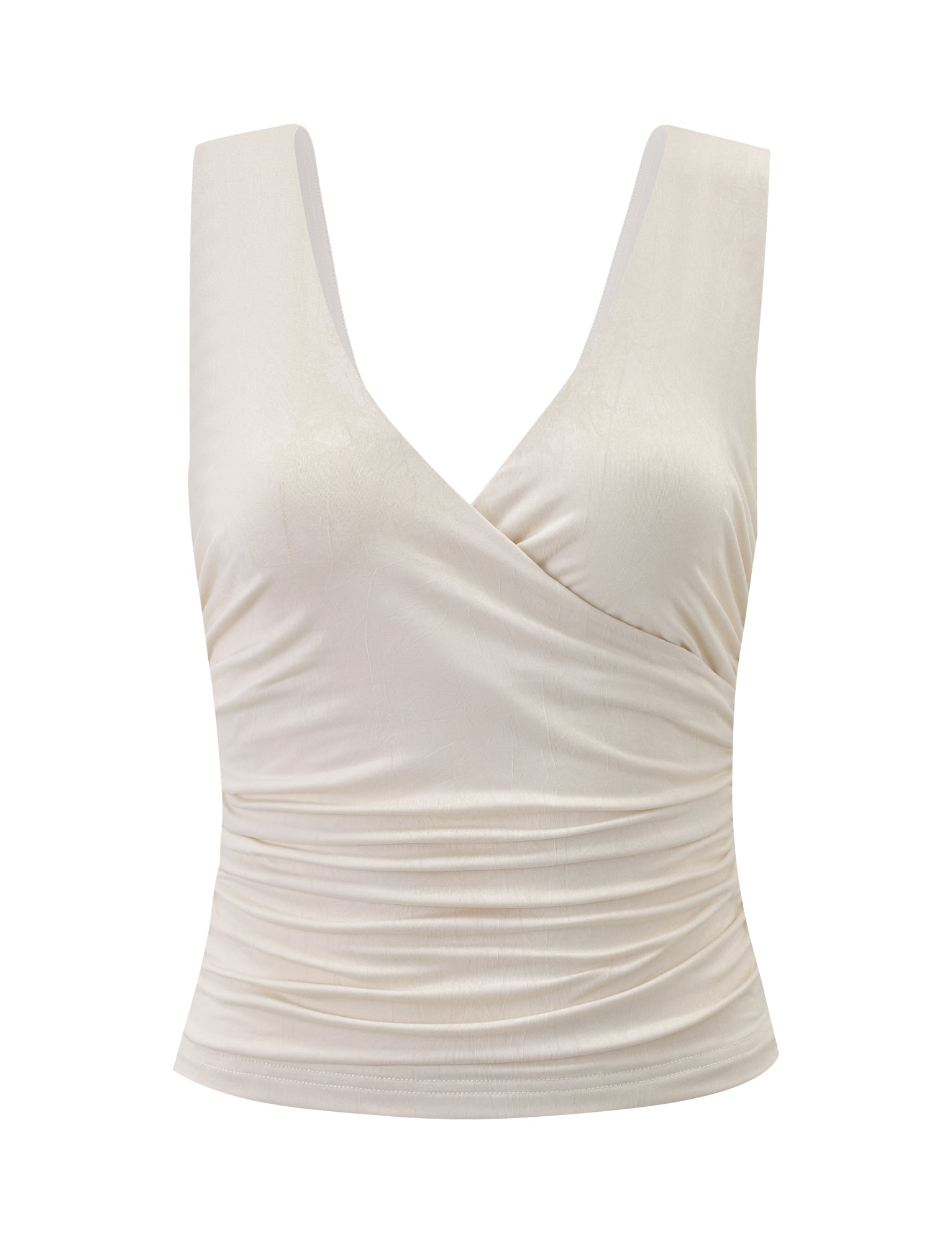 The TIGERMIST NURA TOP - IVORY features a sleeveless, wrap-style design with a deep V-neckline, ruched sides, and wide shoulder straps, shown against a white background.