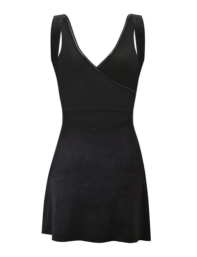 The TIGERMIST NURA MINI DRESS - BLACK is a sleeveless mini dress featuring wide shoulder straps, a crossover V-wrap neckline, fitted bodice, flared skirt, and a subtle patterned skirt.
