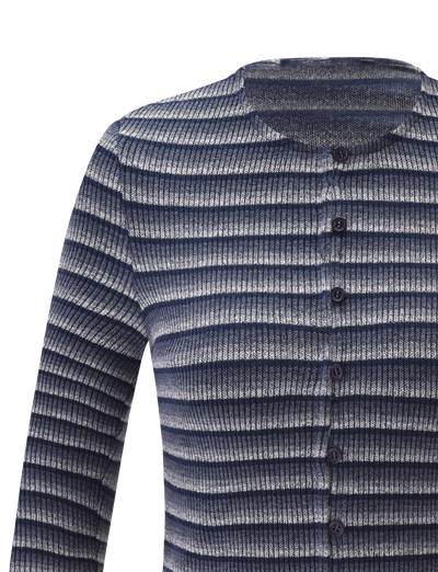 A close-up of the TIGERMIST TIMARA CARDIGAN - NAVY STRIP shows its long sleeves, ribbed knit texture, and mini front buttons. The navy, gray, and white horizontal stripes stand out against a plain white background.
