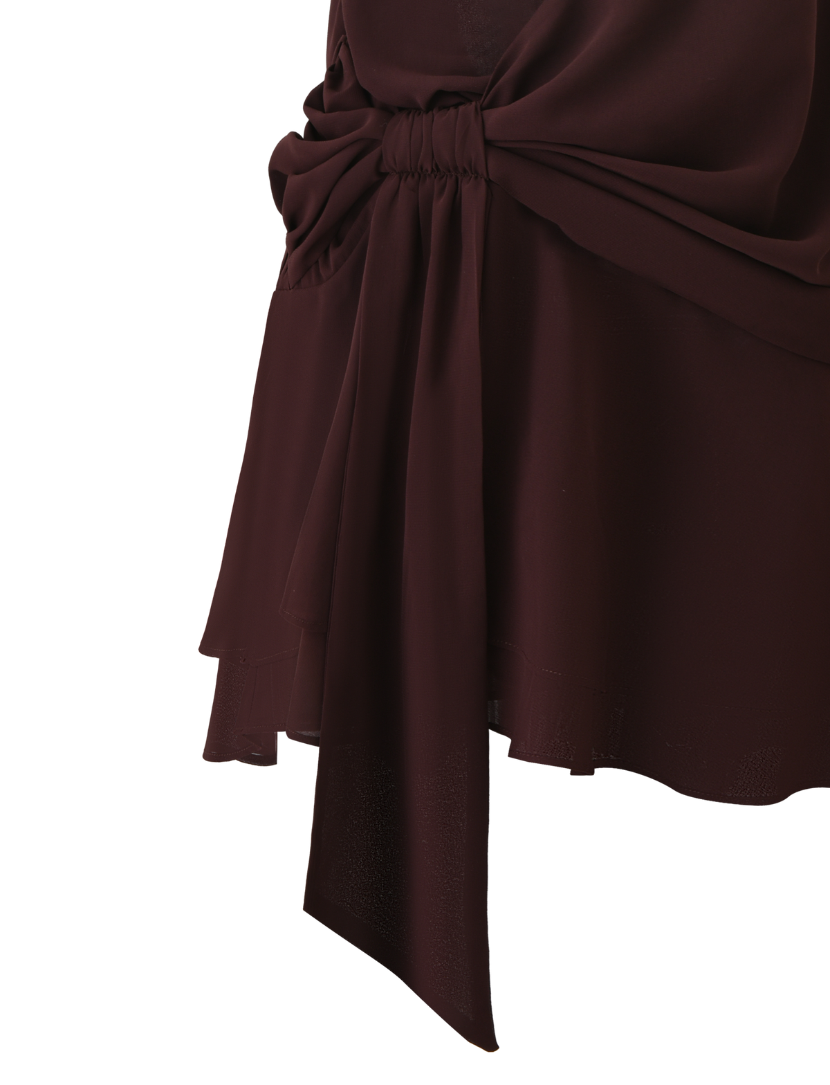 A close-up of the TIGERMIST INDIGO MINI DRESS 2.0 in chocolate, featuring a large gathered bow on the front and showcasing its layered, flowing fabric.