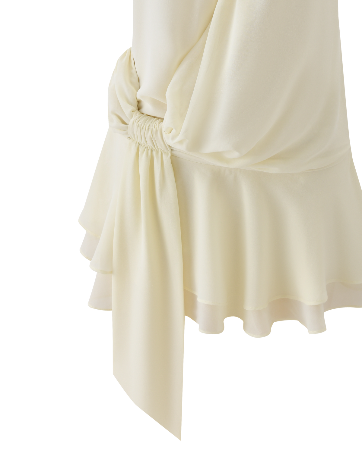 Close-up of the TIGERMIST INDIGO MINI DRESS 2.0 in ivory, featuring a halter neckline, gathered detail, adjustable tie waist, draped hip sash, and a ruffled layered micro mini skirt hemline.