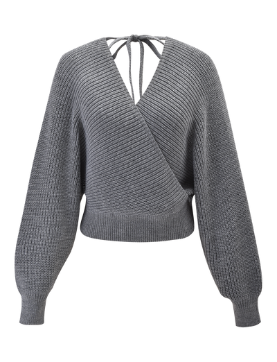 The RAVEN JUMPER - GREY by TIGERMIST is a faux wrap knit with a deep V-neck, ribbed cuffs and hem, plus crisscross tie detail at the back—delivering cozy style to your wardrobe.