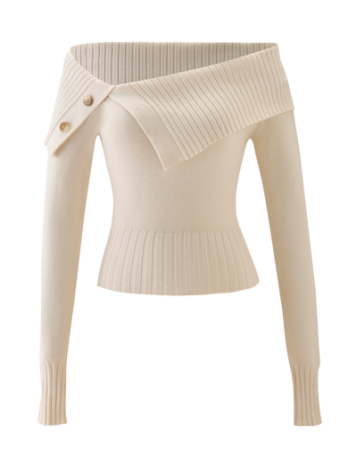 The KIERA JUMPER by TIGERMIST is a cream, long sleeve sweater with an off-the-shoulder asymmetrical ribbed collar, two decorative buttons, and ribbed hem and cuffs.