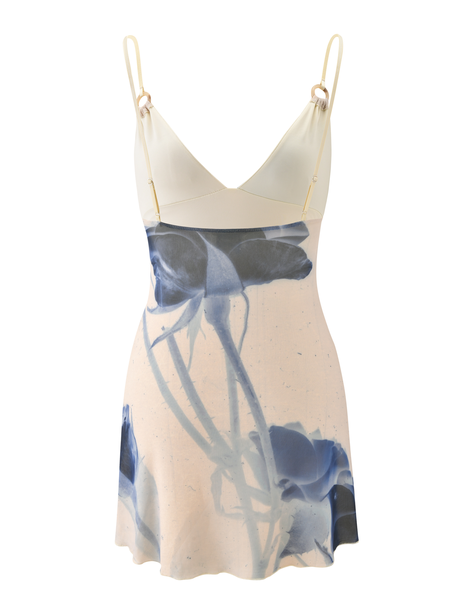 The TIGERMIST ROSY MINI DRESS - INDIGO FLORAL is a sleeveless cream mini dress with adjustable cami straps, a V-neckline, and a bold blue abstract rose print for a fresh, modern style.