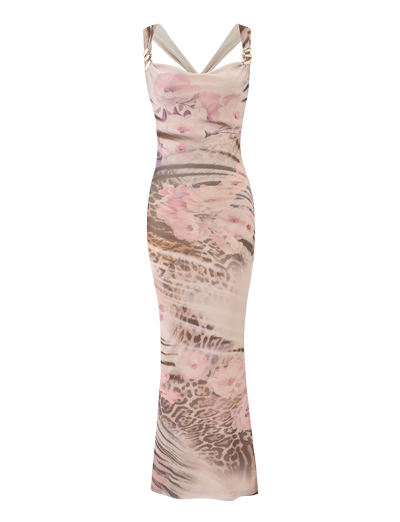 The TAMARIN MAXI DRESS - MOODY ANIMAL FLORAL by TIGERMIST is a sleeveless, floor-length maxi dress with wide straps, a fitted silhouette, and soft pink floral accents on a light animal print background.