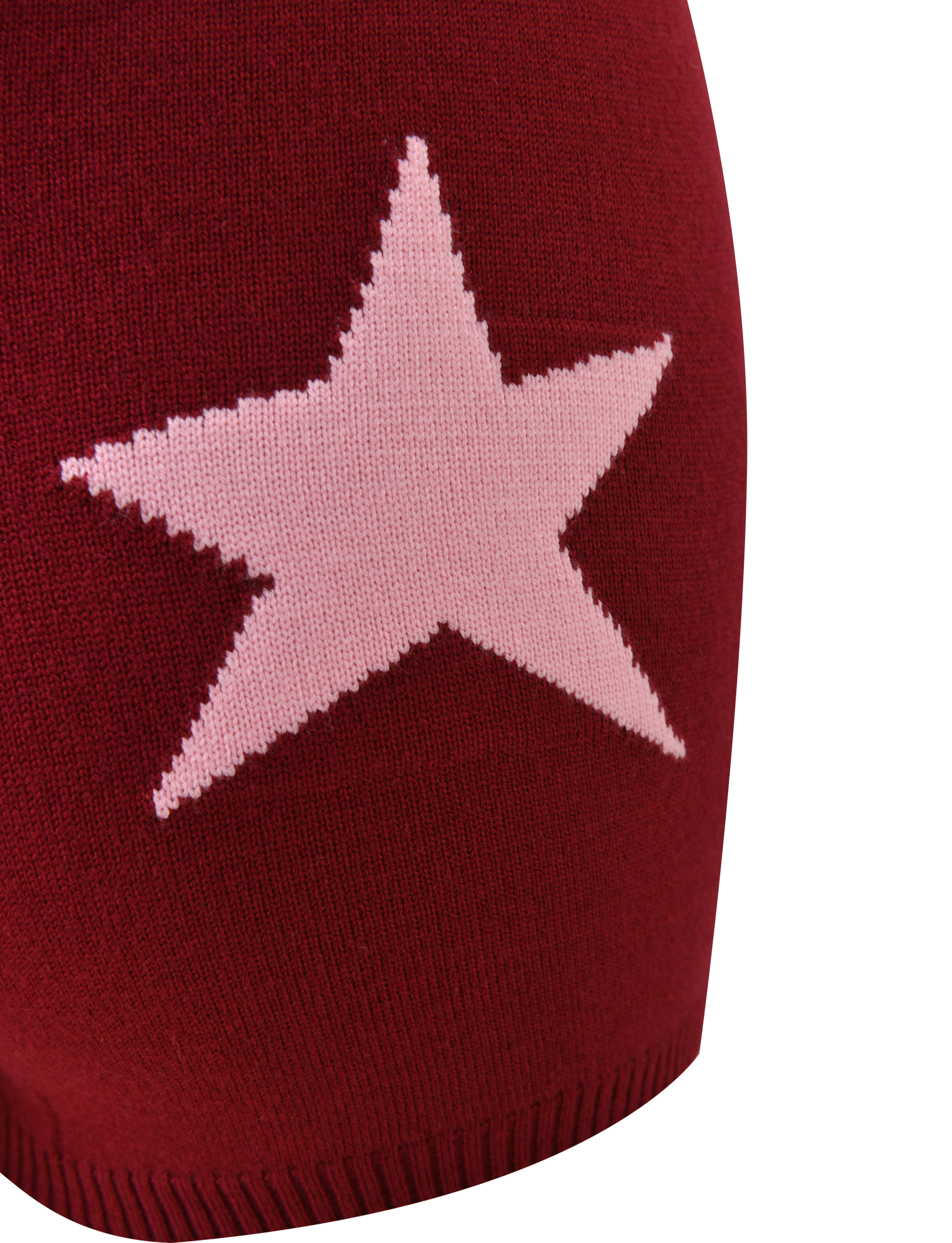 Close-up of the TIGERMIST ROUX SHORT in red, showcasing a maroon knit fabric with an asymmetrical star graphic at the center. The plain background emphasizes the texture and bold design.