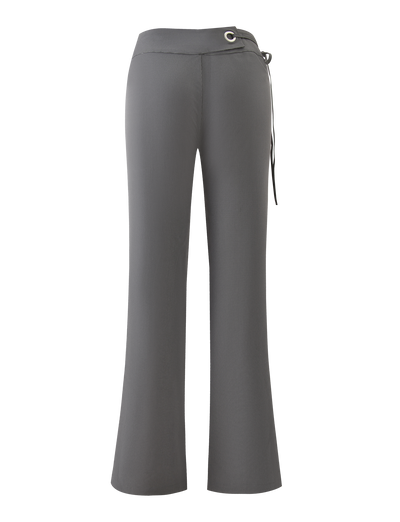 The EMORY PANT - GREY PINSTRIPE by TIGERMIST features a high-waisted, flared silhouette with a fitted waist and grommet-tie detail on the right side, shown from the back.