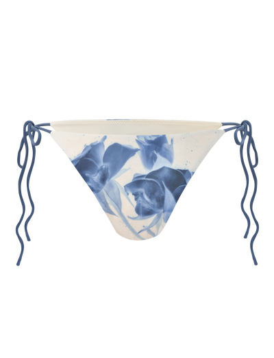 The CYLAS BIKINI BOTTOM by TIGERMIST features an indigo floral rose print in a monochrome design on a white background.