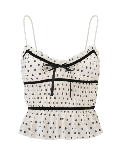 The LIORA TOP - POLKA DOT by TIGERMIST features white polka dots, black trim, adjustable straps, a front bow, ruffled neckline, and peplum hem—bringing playful charm to your summer look.