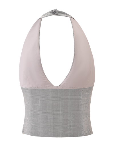 The TERESIA TOP - GREY CHECK by TIGERMIST is a stretch halter top with a buttoned neck, tortoiseshell buttons, a plunging neckline, and a two-tone design: light beige bust and gray plaid lower section.