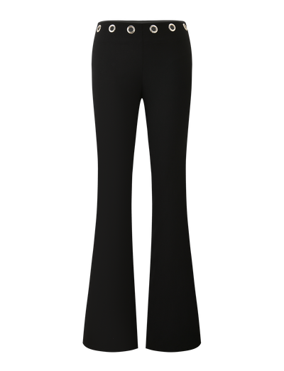The MARREN PANT - BLACK by TIGERMIST features a low-rise waist and silver grommet details around the waistband, displayed against a white background.