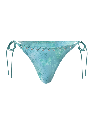 The TIGERMIST ROBYN BIKINI BOTTOM in Blue Butterfly Paisley features a light blue paisley print, lace-up whipstitch detail with silver eyelets at the top edge, and adjustable side ties.