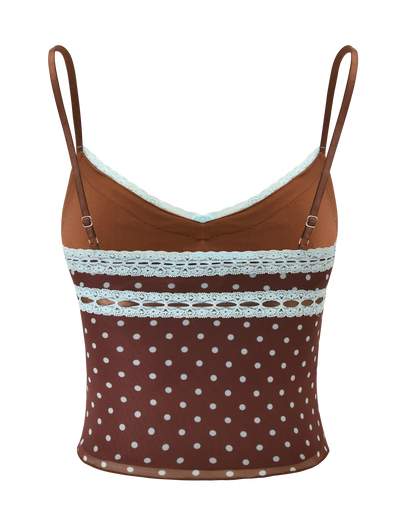 The AMARA TOP - POLKA DOT by TIGERMIST is a brown spaghetti strap mesh cami with playful white polka dots and delicate lace trim, creating a charming and fitted sleeveless look.
