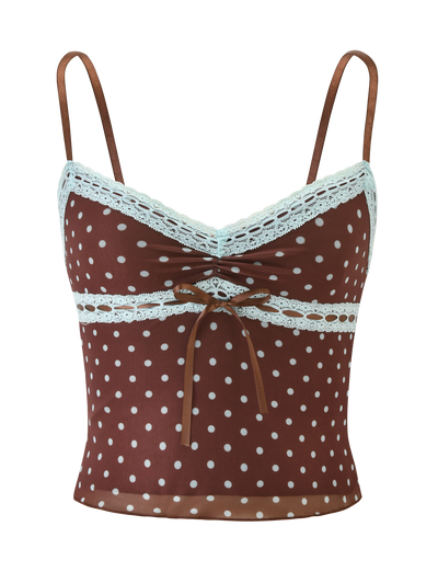 The TIGERMIST AMARA TOP - POLKA DOT is a brown, sleeveless mesh cami featuring polka dots, thin straps, white lace trim along the neckline and underbust, and a small bow at the center front.