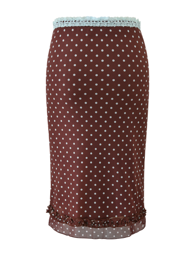 The AMARA MIDI SKIRT - POLKA DOT by TIGERMIST features a brown polka dot print, light blue lace waistband, sheer printed mesh midi ruffle, and small bows at the hem.