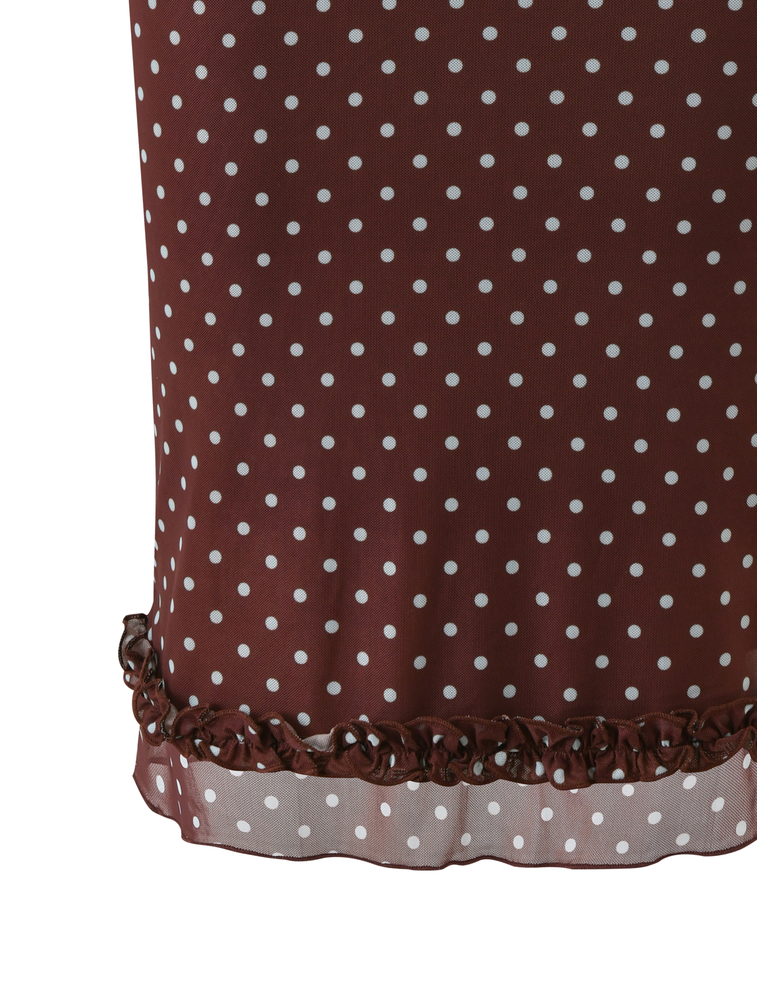 Close-up of the TIGERMIST AMARA MIDI SKIRT - POLKA DOT, showcasing its brown fabric with white spots, ruffled hem, and a slightly sheer lace trim near the edge.