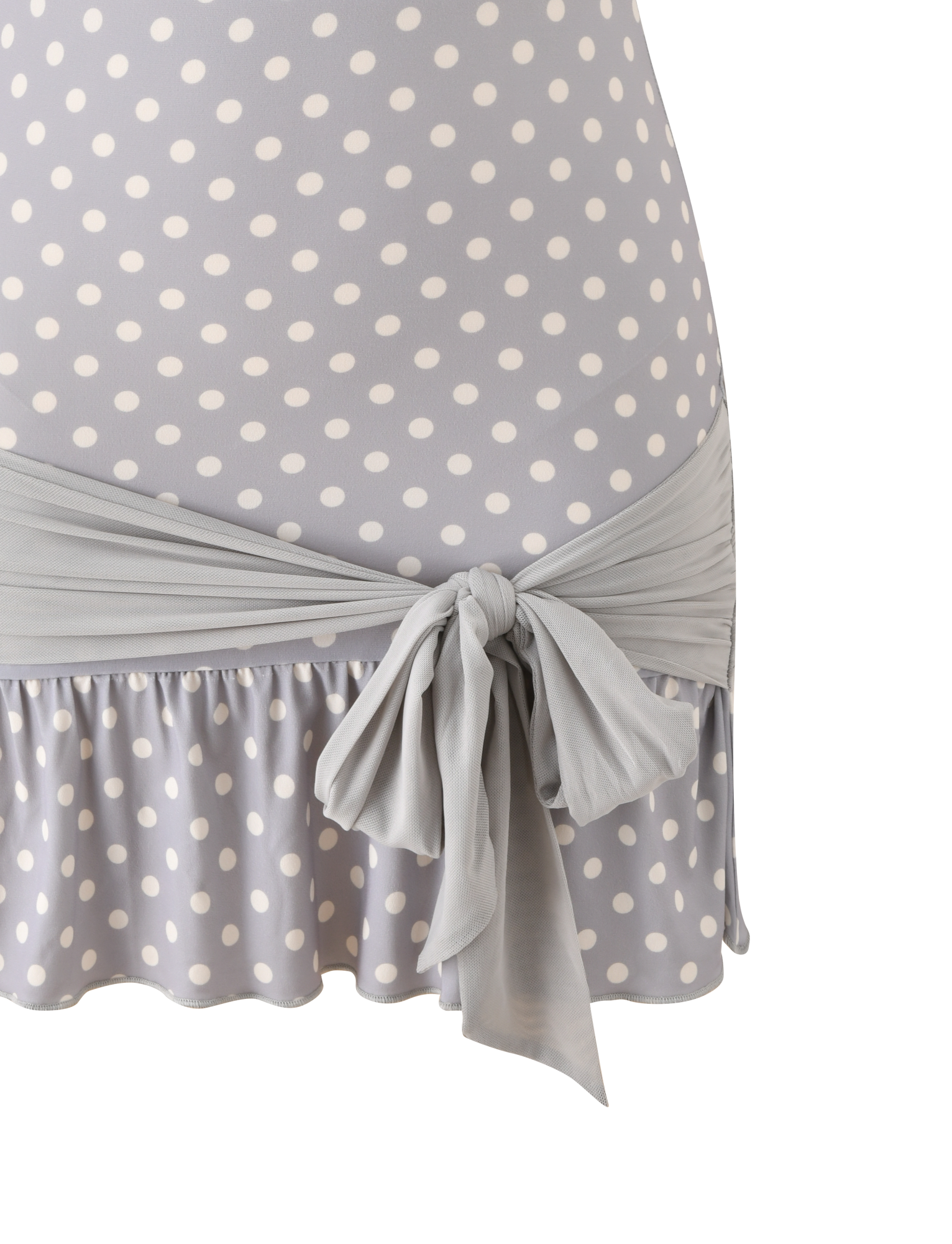 Close-up of the TIGERMIST TOVE MINI DRESS in dove grey with cream dots, featuring a strapless design, ruffle hem, and matching fabric belt tied at the waist.