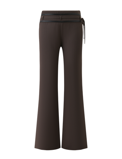 FEDRA PANT - CHOCOLATE by TIGERMIST: Brown flared trousers with subtle pinstripes, PU leather trim, and a black waistband with side tie detail, displayed from the back on a white background.
