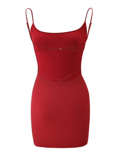 The TIGERMIST MINERVA MINI DRESS in red is a sleeveless, form-fitting bodycon mini dress with thin spaghetti straps and decorative chest and waist strap details, shown on a white background.