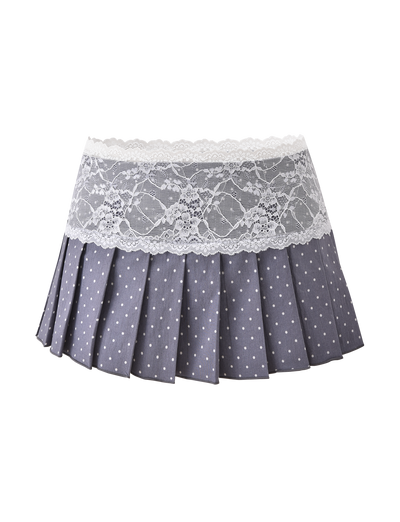 The TIGERMIST KITTIE LACE SKORT - GREY DOT features a pleated mini design in stretch suiting fabric with polka dots and a wide white lace waistband.