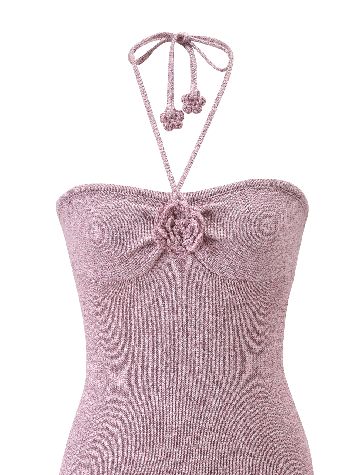 A close-up of the SUNIA DRESS - BABY PINK by TIGERMIST, a mauve knit halter dress with a gathered bust, crocheted flower detail with rose appliqué at the center, and neck tie strings.