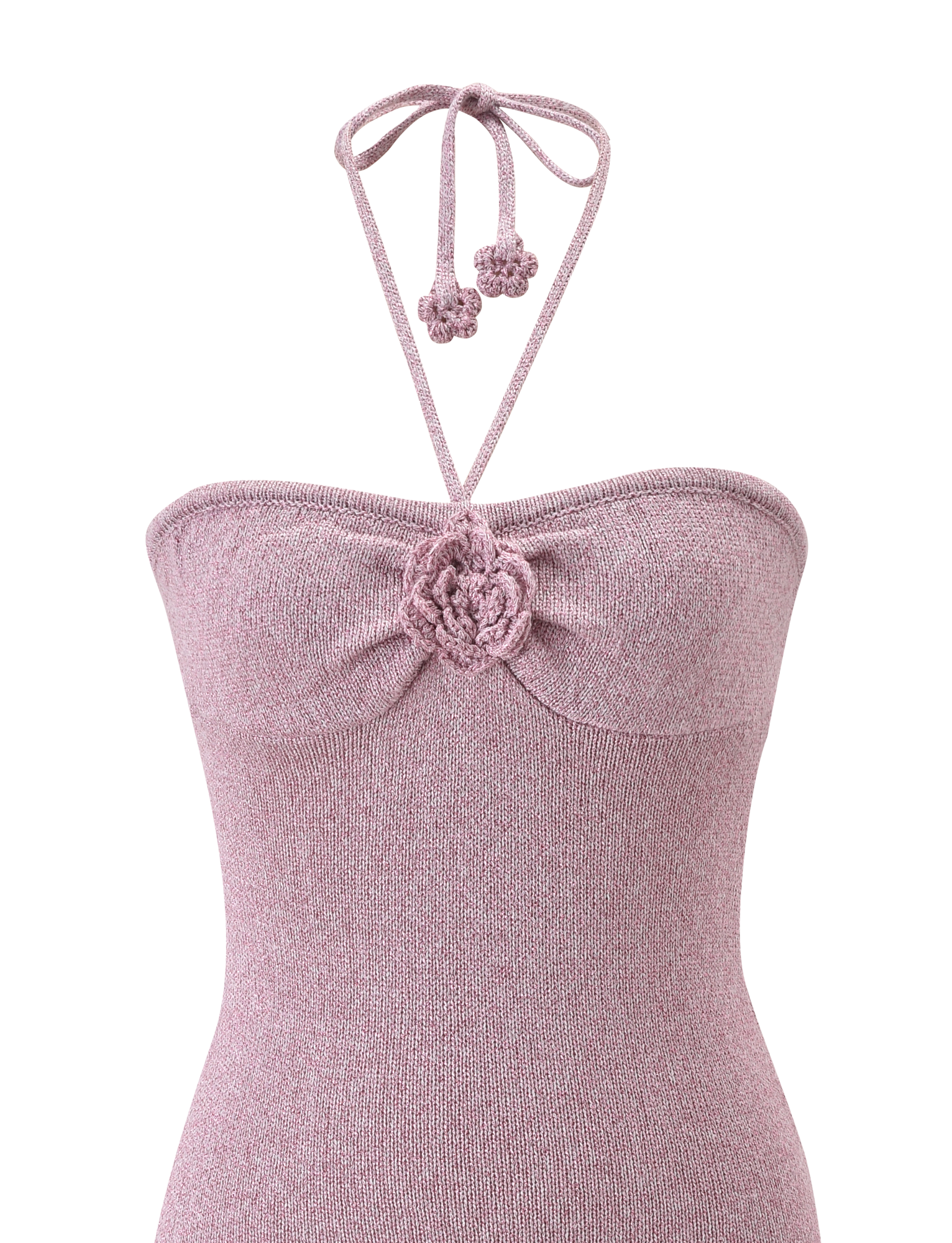 A close-up of the SUNIA DRESS - BABY PINK by TIGERMIST, a mauve knit halter dress with a gathered bust, crocheted flower detail with rose appliqué at the center, and neck tie strings.