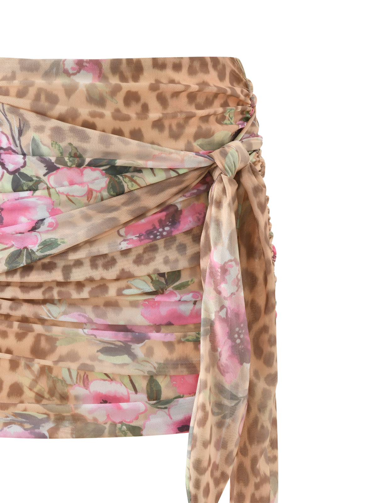 The RISA MINI SKIRT - LEOPARD FLORAL by TIGERMIST features a beige and brown leopard print with pink and green florals, a ruched mini silhouette, and a side tie detail for a draped look.