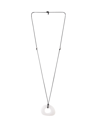 The AMYRA PENDANT NECKLACE - WHITE by TIGERMIST features a long adjustable cord and an irregular white clear resin pendant with a central hole, showcased on a plain white background.