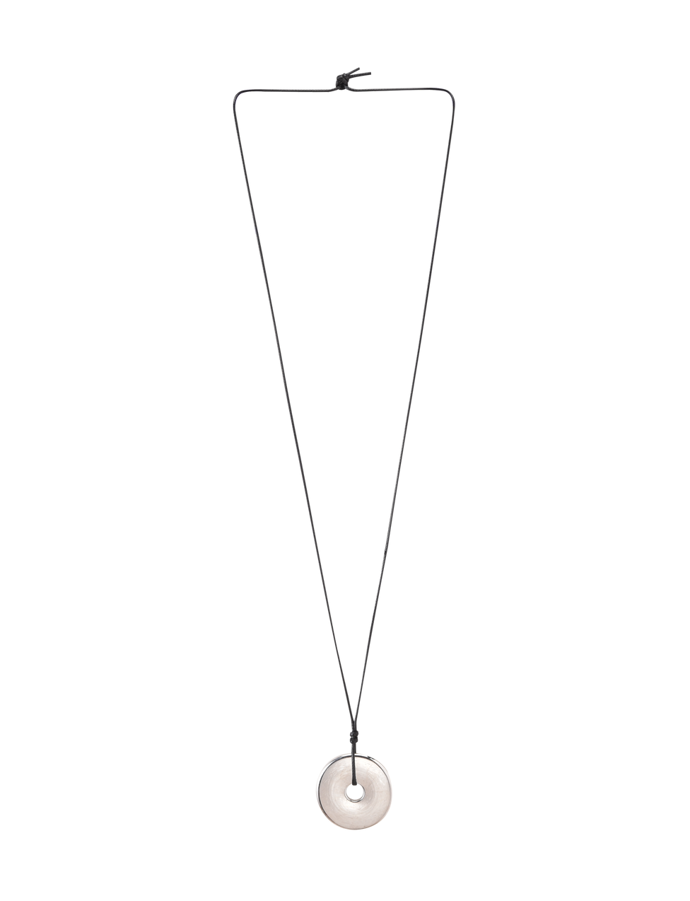 The TIGERMIST AIFE PENDANT NECKLACE - SILVER features a minimalist design with an adjustable black cord and a round, flat silver pendant with a central hole. The knotted cord allows for easy length adjustment.